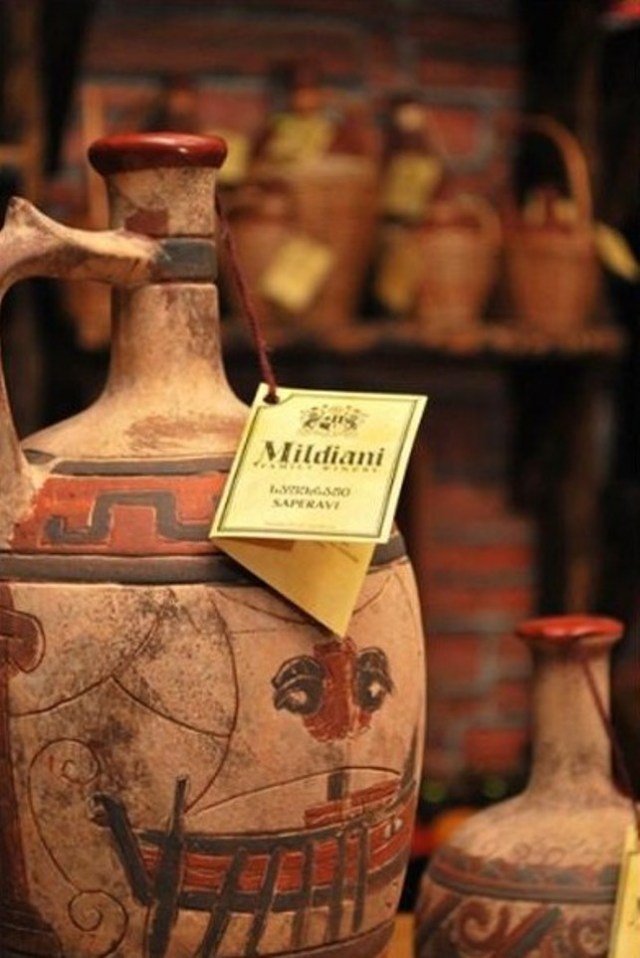 A ceramic wine bottle
